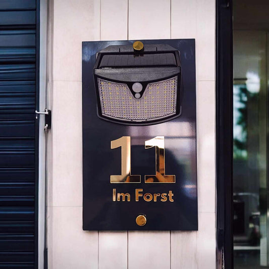 address sign with solar lighting